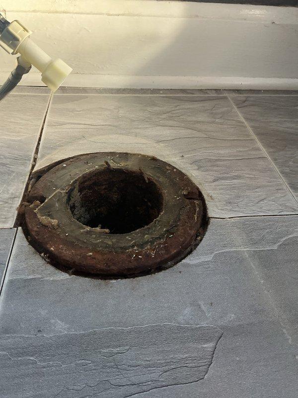 Completed installation of ADA-compliant skirted toilet on return service call. Replaced existing unit with new elongated bowl model featuring sanitary bar design and improved water efficiency. Installation included new wax ring and bolts to properly secure fixture.