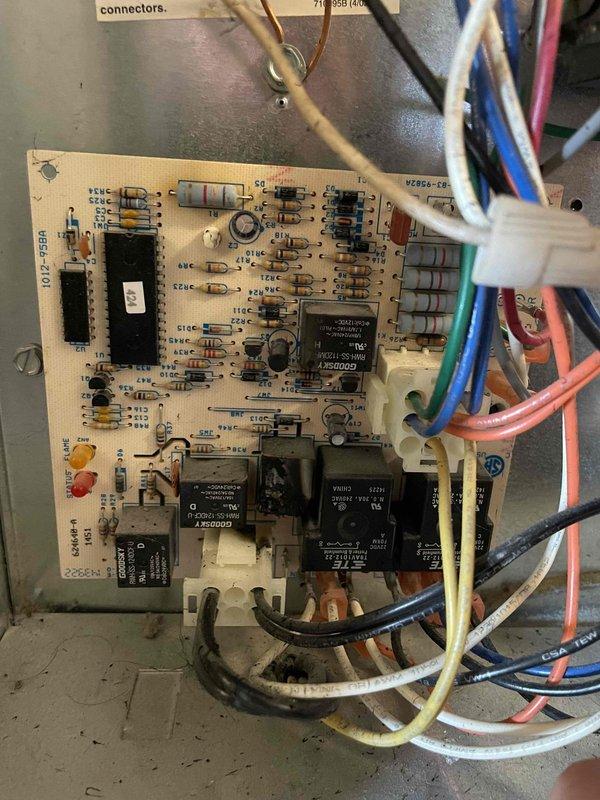 Diagnosed control board failure on 10+ year old heating system where one of the relays failed (visible burn damage). Previous service call had addressed a spider web obstruction, not a motor replacement as customer had mentioned. Customer was advised of replacement board options but elected to seek alternative solutions. Diagnostic fee collected.
