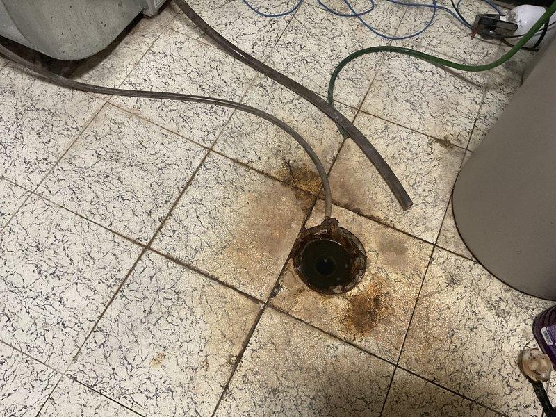 Diagnosed and resolved a clogged drainage system where the kitchen stack from the main floor was connected under the slab near the floor drain, causing backup. Successfully cleaned the kitchen drain through the stack cleanout and the floor drain through its dedicated cleanout, then tested and flushed all affected drains to verify proper flow restoration.