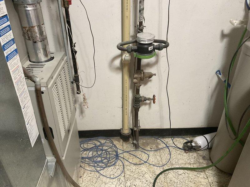 Diagnosed and resolved a clogged drainage system where the kitchen stack from the main floor was connected under the slab near the floor drain, causing backup. Successfully cleaned the kitchen drain through the stack cleanout and the floor drain through its dedicated cleanout, then tested and flushed all affected drains to verify proper flow restoration.
