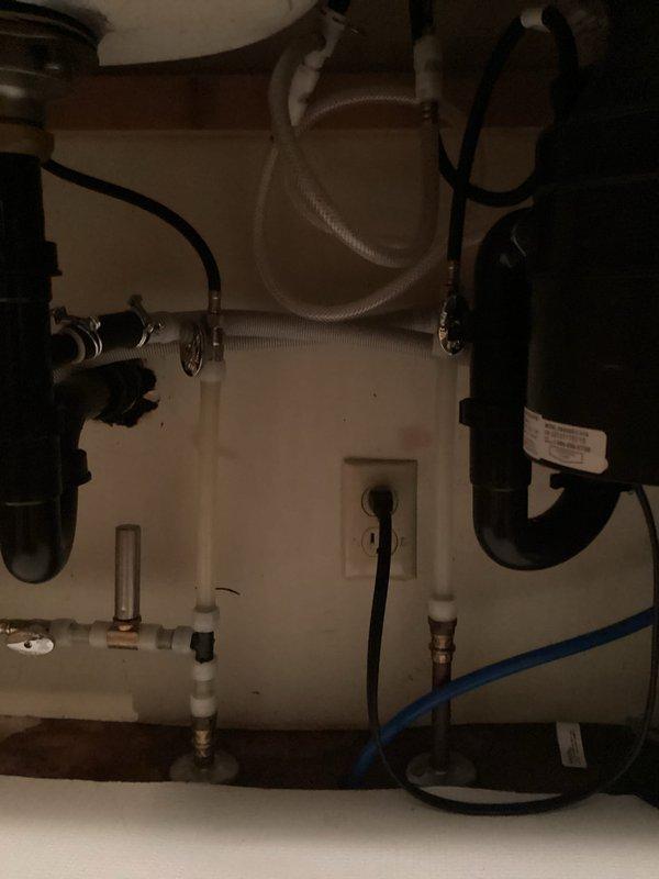 Successfully installed customer-supplied kitchen faucet in existing stainless steel double-basin sink. Properly connected all supply lines and verified operation of main faucet and side fixtures. No leaks observed at connections after installation and testing.