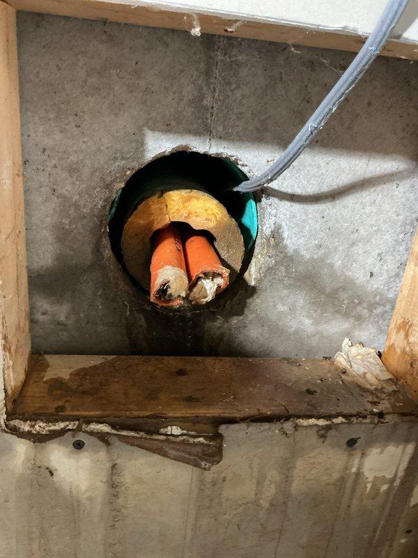 Responded to service call for water leakage from disconnected hoses of an outdoor wood burner in the furnace room, causing flooding and potential mold issues. Assessed the situation and advised customer to seal the basement opening and install drain tile outside to properly manage water intrusion. Attempted to install whole house water filter but had incorrect size; replacement filter has been ordered and will be shipped directly to customer's residence.