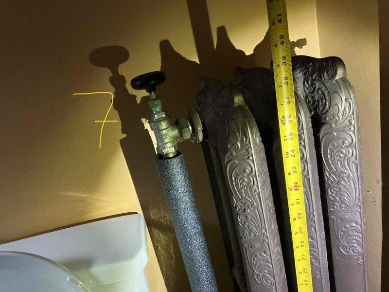 Conducted comprehensive assessment of steam heating system in probate property where city water line work resulted in multiple radiator failures. Documented evidence of leaks in at least 5 radiators through visual inspection of water damage patterns and corrosion. Took detailed measurements of all radiators to prepare quotes for selective replacement, complete system replacement, and conversion to baseboard heating options.