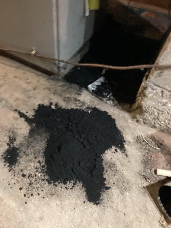 Responded to service call for oil furnace that failed to re-light after running out of fuel. Diagnosed heavily sooted system due to lack of maintenance; performed complete tune-up including cleaning of nozzle, chimney, and all clean-out ports. Successfully removed accumulated soot, replaced nozzle, and verified proper system operation despite tank shutoff and filter remaining frozen outside.