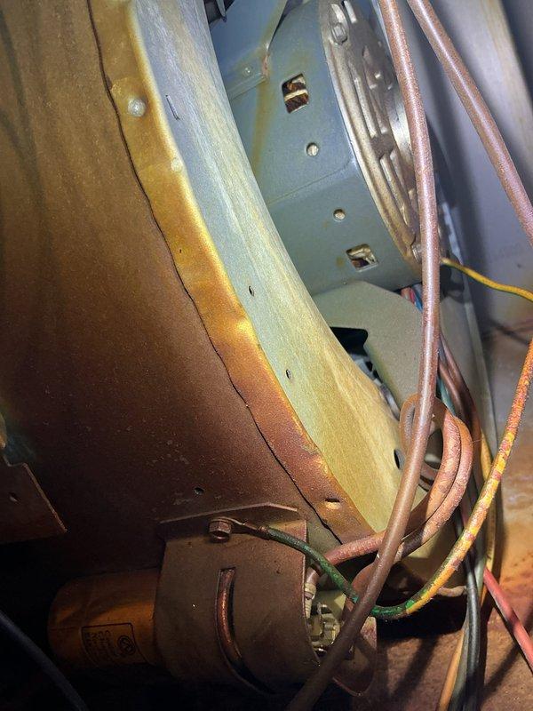 During routine furnace maintenance on a 12-year-old unit, discovered significant water damage affecting the heat exchanger, blower motor, and control board. Heat exchanger failure confirmed and system was tagged out for safety. Recommended complete replacement of heat exchanger, blower motor, and control board to restore system functionality.