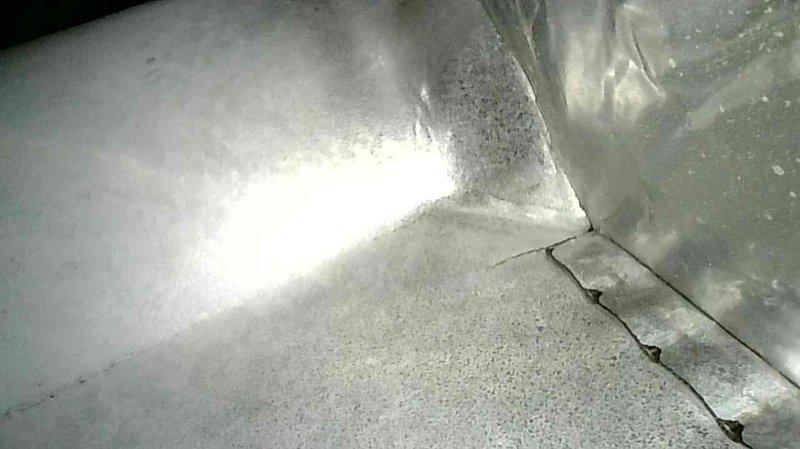 Responded to no heat call for American Standard furnace with intermittent ignition failure. Diagnosed and cleaned flame sensor, which resolved immediate issue. Inspection revealed small cracks in heat exchanger inlet and noisy inducer motor that may be affecting proper gas draw to igniter. Provided customer with replacement options for both furnace and water heater.