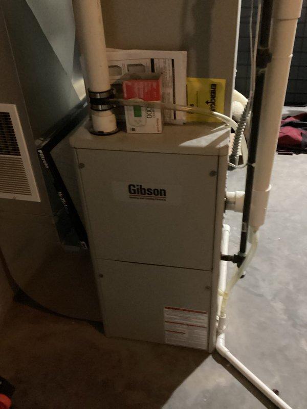 Diagnosed and replaced non-functional garbage disposal that was stuck and unable to turn. Installed new 1/2 HP garbage disposal unit and reconfigured drain on the opposite side to restore proper kitchen waste disposal functionality.