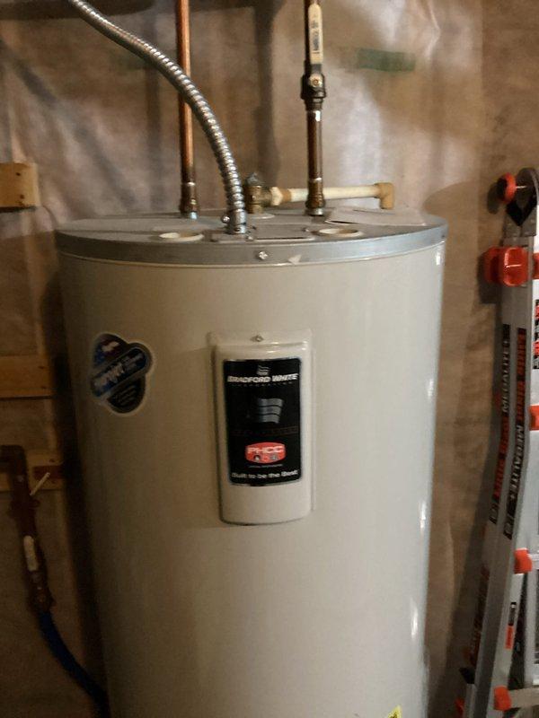 Diagnosed and replaced non-functional garbage disposal that was stuck and unable to turn. Installed new 1/2 HP garbage disposal unit and reconfigured drain on the opposite side to restore proper kitchen waste disposal functionality.