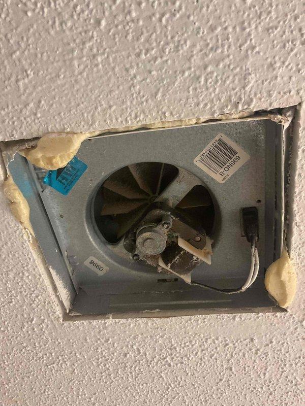 Diagnosed bathroom ventilation issues and found flapper stuck open due to dust accumulation. Removed debris causing obstruction, allowing flapper to close properly. Replaced aging exhaust fan unit to ensure proper ventilation and prevent future condensation issues.