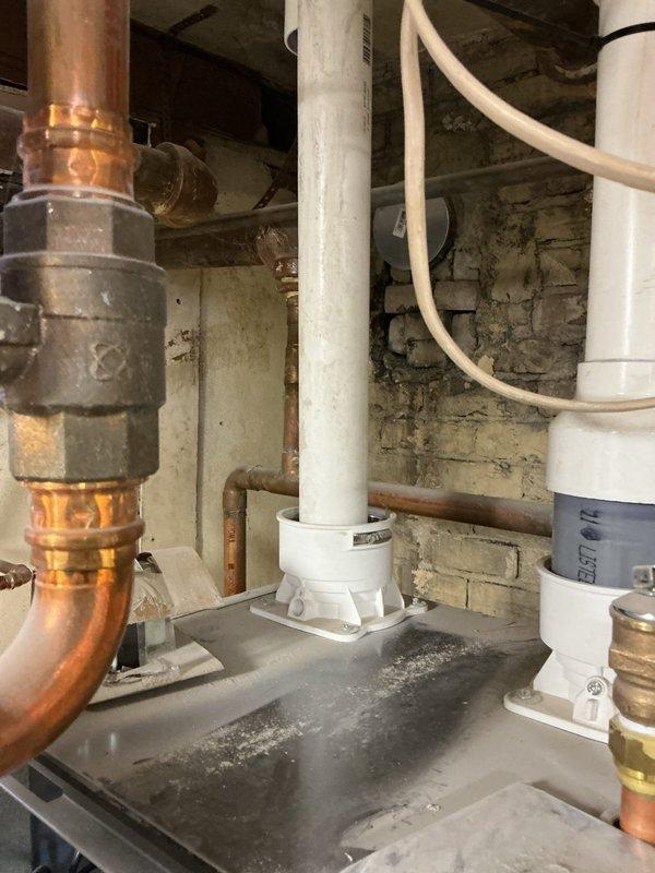 Responded to service call for boiler lockout (error code 501) with ignition failure (code 63). Diagnosed issue as dust accumulation on igniter and flame sensor in construction environment affecting ignition sequence. Performed cleaning of components as temporary solution to restore heat functionality.