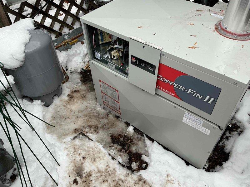 Responded to warranty service call for a recently installed Lochinvar snow melt boiler experiencing short cycling issues (running 1 minute, off 10 minutes). Determined the target slab temperature was set too low at 36°F, causing the system to short cycle due to proximity to ambient air temperature. Adjusted target temperature to 45°F and confirmed proper operation with the boiler maintaining the 180°F set point without short cycling.