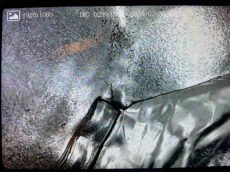 Diagnosed 20-year-old furnace with inoperable blower due to failed ECM motor. Inspection revealed cracked heat exchanger above high limit switch, rendering unit unsafe for operation. Scheduled same-day estimate for replacement furnace.