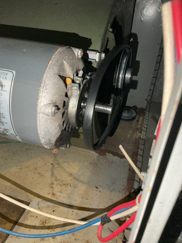 Diagnosed furnace failure caused by detached pulley resulting in stripped motor shaft. Documented damage to 20+ year old unit and completed parts order form for replacement blower motor and pulley. Will return to install new components once parts arrive.