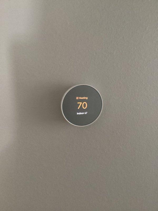 Responded to call for upstairs furnace not keeping up with temperature demand. Diagnosed issue with NEST thermostat communication - system was in idle state despite active call for heat. Cycled power to restore operation, replaced batteries in both thermostats which corrected temperature reading discrepancies. Verified proper furnace operation with good temperature rise and no error codes. Customer advised that NEST thermostat may require replacement if issues persist.