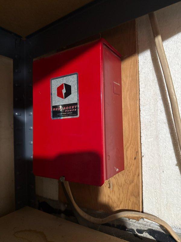 Responded to service call for complete loss of water pressure. Investigated Red Jacket pump system and Challenger pressure tank showing zero pressure despite power. Conducted electrical diagnostics including ohm testing of pump components. Due to specialized well system requirements, referred customer to Pelky plumbing for further service.