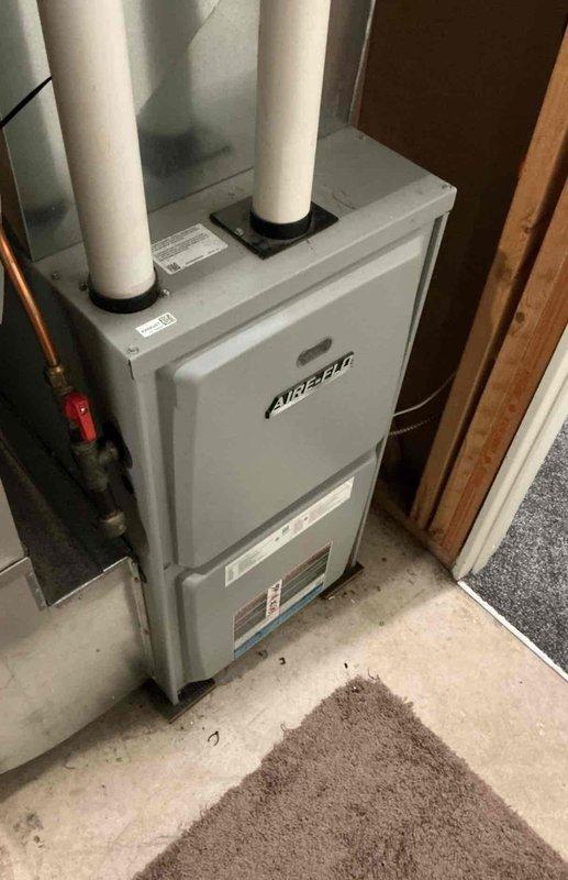 Diagnosed and resolved intermittent heating issue on 2019 Airtemp furnace where temperature would drop to 60-61°F after thermostat adjustments. Inspection revealed a loose wire connection behind the thermostat which was secured. Performed complete system check and verified proper operation of the furnace.