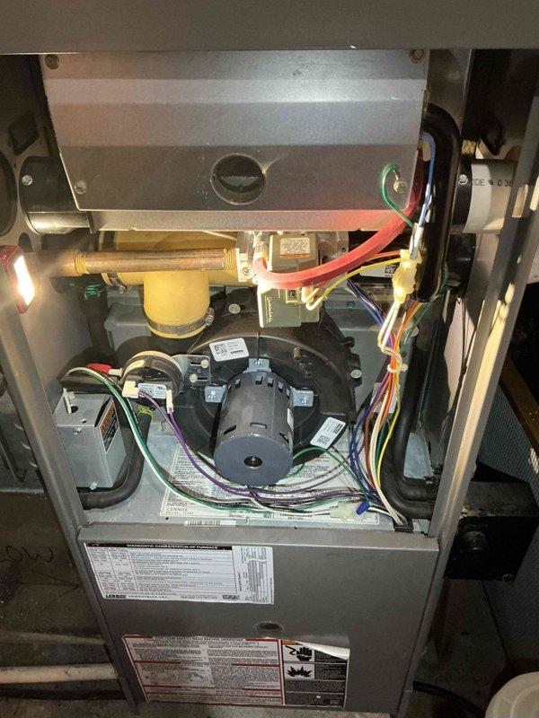 Responded to no-heat call for 19-year-old Lennox furnace displaying open limit code. Reset furnace and reseated limit switch which restored proper operation. Inspection revealed excessive rust around burner inlet and potential crack formation at heat exchanger eyelet, indicating end-of-life condition. Customer opted for temporary repair while pursuing system replacement.
