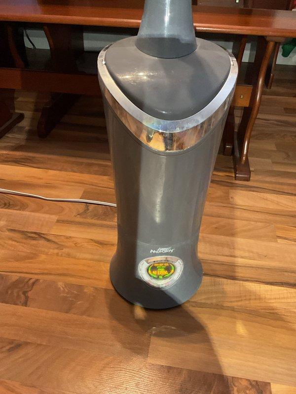 Responded to service call for intermittent heating issue with 10-year-old heat pump system. Diagnosed multiple issues including: plugged 5-inch filter due to ultrasonic humidifier usage, inducer motor operating loudly and out of specification, partially stripped collector box screw, incorrect exterior terminations, and unglued PVCT2 inducer fern coal. Observed primary heat exchanger overheating and system cycling (30-60 seconds) with occasional banging noises during startup/shutdown. Provided repair quote for inducer and collector box replacement.