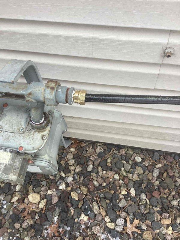 Completed installation of new 1/2-inch gas line running to the meter per sold estimate, including capping of the old gas line in the wall. Connected new gas line to exterior regulator assembly with proper fittings, ensuring secure installation to the building's exterior wall.