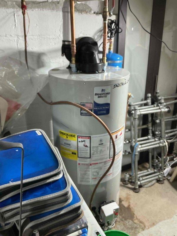 Responded to service call for no water flow to upstairs sink following customer's sink replacement on lower level. Diagnosed issue as blocked aerator in faucet. Successfully restored water flow by disassembling and cleaning the aerator using specialized tool. Inspected water heater and HVAC system while on site to ensure proper operation.