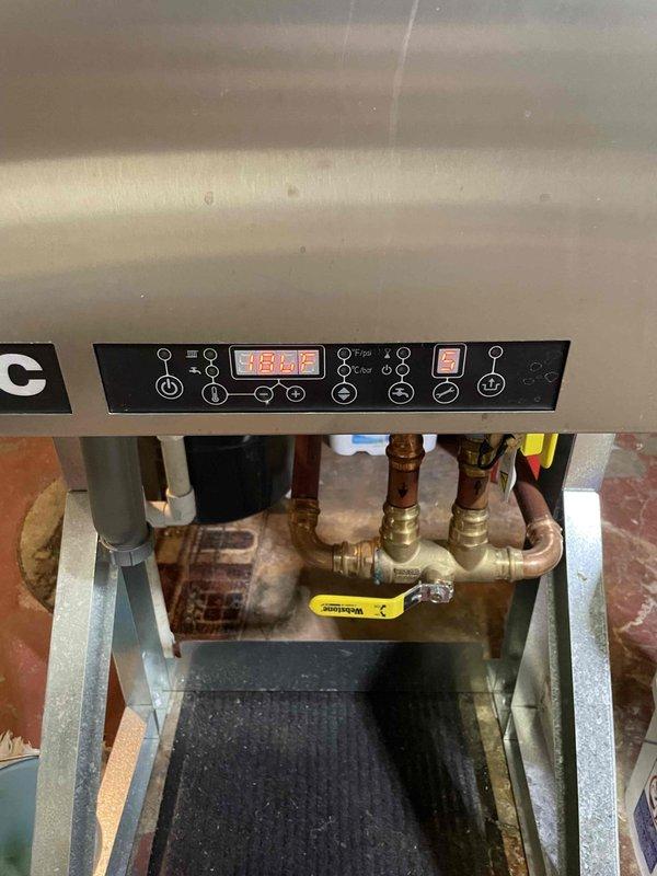 Responded to service call for reported issues with boiler unit displaying Code 5. Verified through manufacturer's technical manual that Code 5 indicates normal "Space Heating" operation, not a malfunction as customer believed. Demonstrated proper interpretation of service display codes, confirming unit is functioning as designed with no combustion issues. Previously repaired water leak was also verified to be resolved.