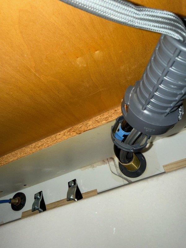 Responded to service call for loose kitchen faucet. Upon inspection, determined that the Glacier Bay fast mount system was broken and no longer securing the fixture properly. Provided customer with estimate for complete faucet replacement as repair of existing mounting hardware not feasible.