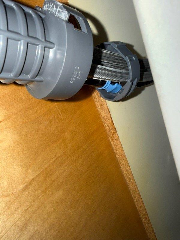 Responded to service call for loose kitchen faucet. Upon inspection, determined that the Glacier Bay fast mount system was broken and no longer securing the fixture properly. Provided customer with estimate for complete faucet replacement as repair of existing mounting hardware not feasible.