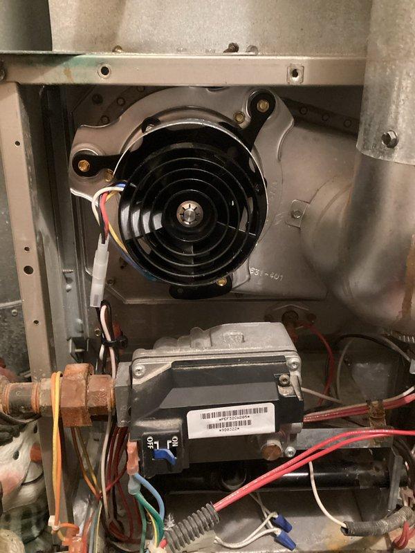 Replaced damaged draft combustion inducer assembly on furnace after identifying issues with the motor shaft. Performed comprehensive system check including heat exchanger, flame sensor, ignitor, and wiring connections, and replaced air filter. System now operating normally with proper combustion and airflow.
