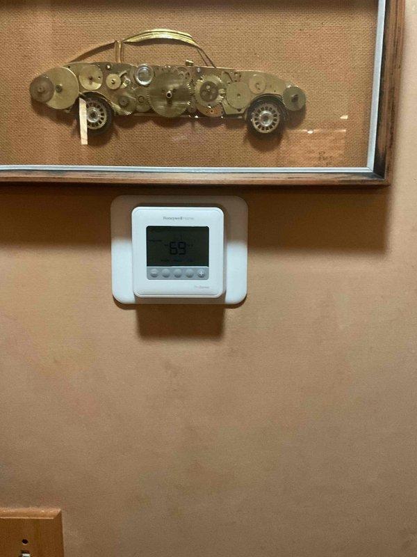 Completed installation of a Honeywell Hz322 zone panel and replaced two zone dampers with motors (20x12 and 20x14). Due to the original system using a separate heat/cool switch that was incompatible with the new zone panel, upgraded one thermostat to a T4 model at no additional charge, with customer opting to replace the second thermostat for uniformity. All equipment tested for proper functionality after installation.