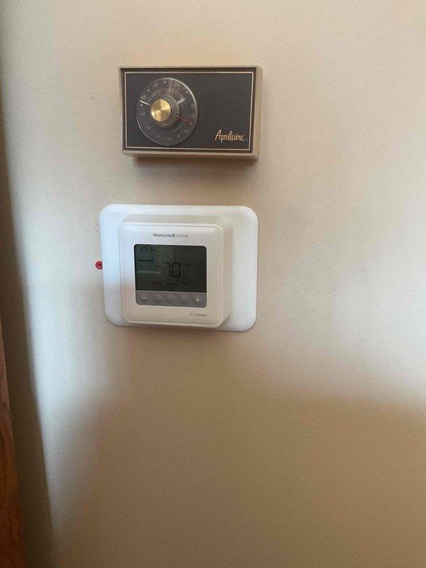 Completed installation of a Honeywell Hz322 zone panel and replaced two zone dampers with motors (20x12 and 20x14). Due to the original system using a separate heat/cool switch that was incompatible with the new zone panel, upgraded one thermostat to a T4 model at no additional charge, with customer opting to replace the second thermostat for uniformity. All equipment tested for proper functionality after installation.