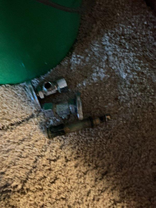 Responded to emergency call for burst copper pipes in basement caused by freezing conditions. Discovered multiple failure points in the plumbing system with active water leakage causing basement flooding. Completed comprehensive repairs including installation of new shower valve, replacement of shut-off valves, and repairs to eight separate pipe leaks to restore system integrity and prevent further water damage.