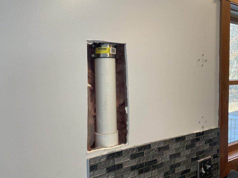 Responded to emergency call for pipe damage in kitchen. Customer had inadvertently drilled through a 3" PVC stack while installing shelves. Successfully repaired the damaged section by cutting out the affected portion and installing new PVC pipe with appropriate fittings, restoring proper drainage function.