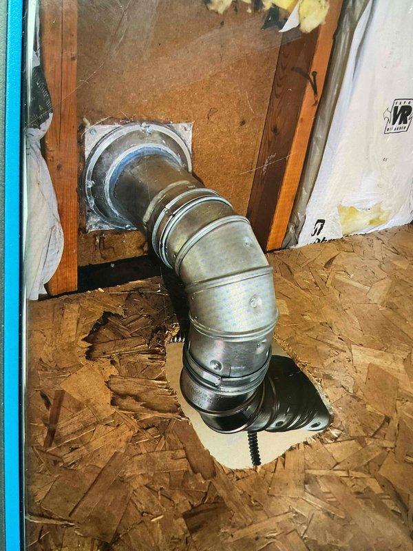 Returned to site to document existing B-vent configuration and gather required photographs for horizontal venting assessment. Inspected galvanized ductwork installation with L-shaped elbow joint mounted against OSB backing, confirming 1" clearance requirements around exhaust pipe. Compiled necessary parts list information for proper horizontal wall venting as specified in manufacturer's documentation.