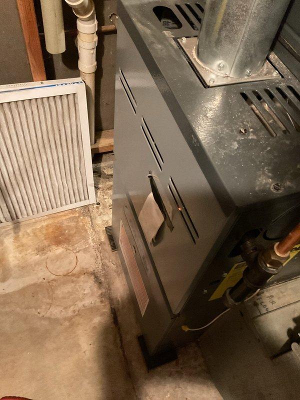 Performed standard furnace tune-up service on unit of undetermined age. Completed comprehensive operational testing, cleaned flame sensor, and inspected electrical components. Verified heat exchanger integrity through visual inspection with no issues detected. Confirmed air filter was clean and system functioning properly.