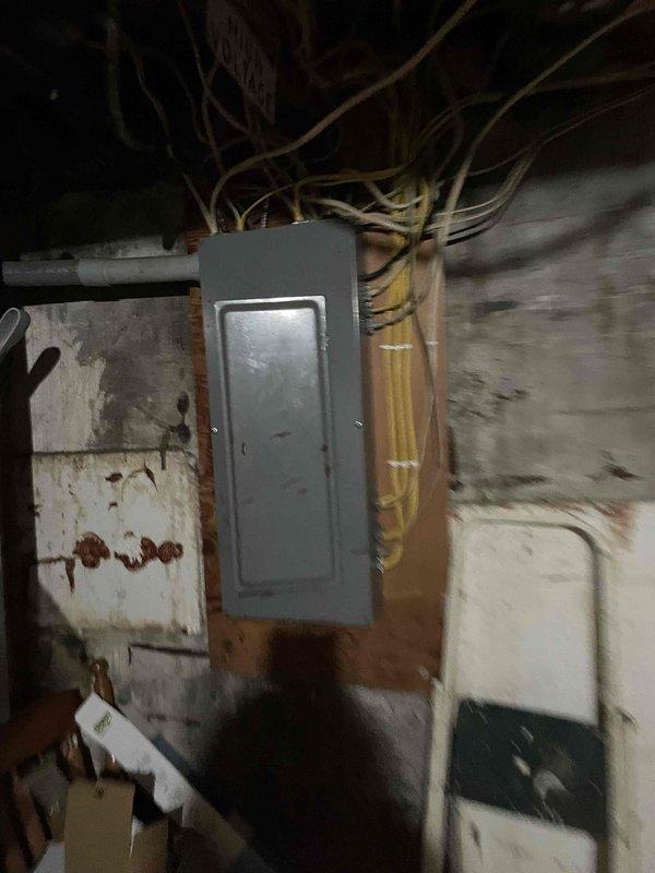 Performed oil furnace tune-up and safety check including fire side cleaning, nozzle replacement, and oil filter replacement on commercial bar line. Diagnostic testing revealed significant negative building pressure when commercial range hood operates, causing combustion air starvation and exhaust backdrafting through multiple pathways. Recommended upgrading to sealed combustion gas boiler to resolve ongoing ventilation issues.