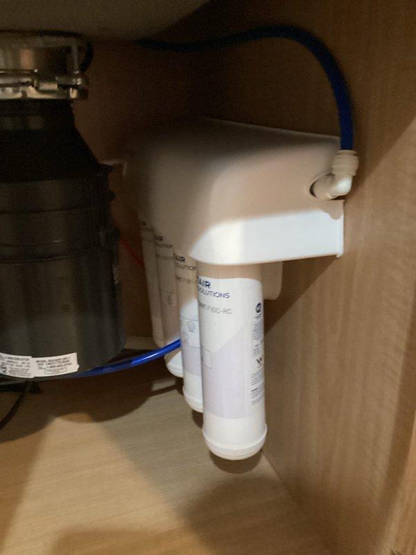Completed installation of customer-supplied kitchen faucet with pull-down sprayer feature and replaced the existing RO (reverse osmosis) filter cartridges. System was suspected to have minor clogging issues prior to service; all components were properly installed and tested with no leaks observed upon completion.