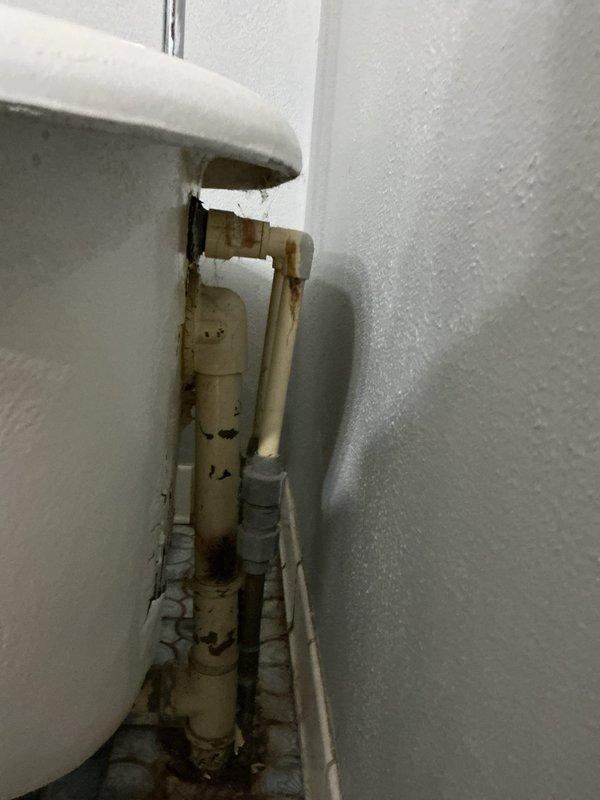 Completed installation of new clawfoot tub faucet as sold repair. Removed old deteriorated fixture and installed replacement faucet of similar style, ensuring proper connections with existing plumbing. Work addressed visible corrosion issues in the bathroom plumbing system while restoring full functionality to the tub.