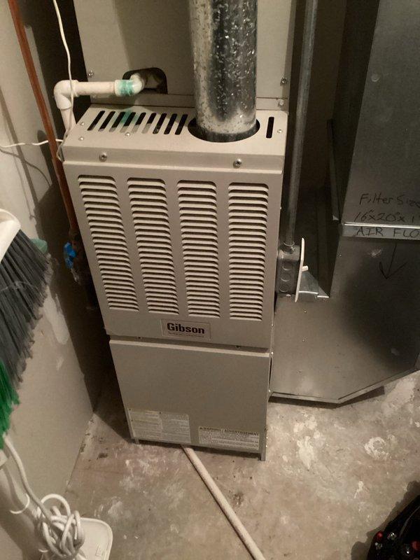 Responded to no-heat call for Gibson furnace over 10 years old. Diagnosed flame sensing failure where unit would attempt ignition but shut down before establishing heat. Removed and thoroughly cleaned flame sensor to restore proper operation, then inspected heat exchanger and electrical components to confirm system integrity. Furnace now starting up and operating correctly after service.