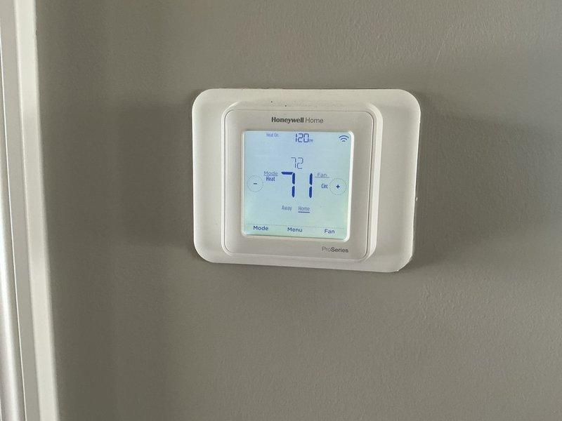 Conducted airflow testing in response to homeowner's reports of cold spots and uneven air distribution on the second floor. Discovered partially closed dampers and restricted airflow caused by flexible ductwork installation. Adjusted multiple dampers to improve balance and advised homeowner on potential garage heater installation to address temperature issues in room above garage.