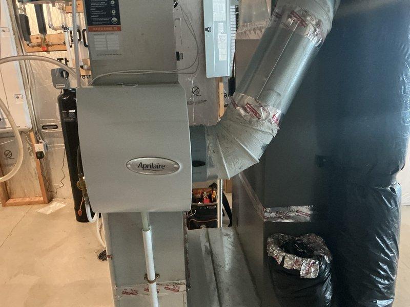 Conducted airflow testing in response to homeowner's reports of cold spots and uneven air distribution on the second floor. Discovered partially closed dampers and restricted airflow caused by flexible ductwork installation. Adjusted multiple dampers to improve balance and advised homeowner on potential garage heater installation to address temperature issues in room above garage.