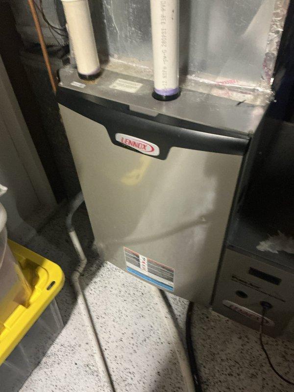 Performed preventative maintenance on a 12-year-old Lennox furnace system with integrated UV lights. Inspected internal components including electrical connections, control board, and ventilation pipes, finding all in good working condition. Advised customer on proper filter replacement (16x26x5 size) and provided website information for ordering.