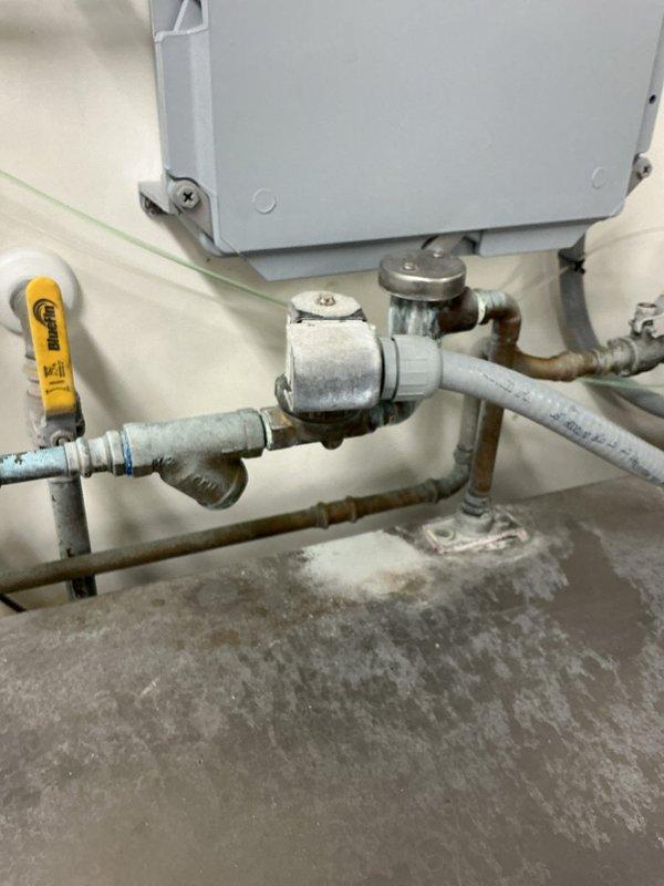 Responded to commercial customer complaint of low water pressure affecting dishwasher operation. Diagnosed faulty solenoid valve as the root cause of insufficient water flow. Ordered replacement cleanout cover to address broken component and submitted part order form per management instruction.