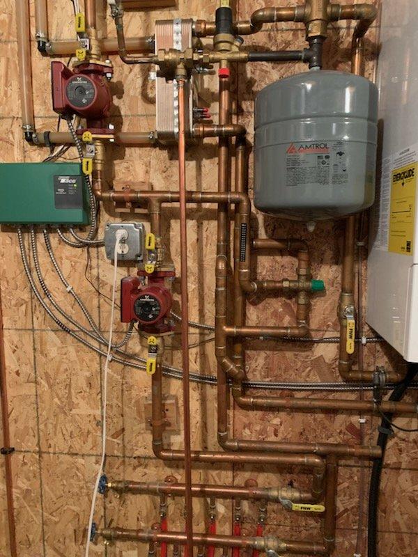 Responded to service call for boiler system with reported backflow preventer leak. Inspected the hydronic heating system, which included copper piping, plate heat exchanger, expansion tank, and circulation pumps. Successfully stopped the active leak on the backflow prevention device through temporary measures. Advised customer that while the immediate leak has been addressed, the backflow preventer will require complete replacement if the leak recurs.
