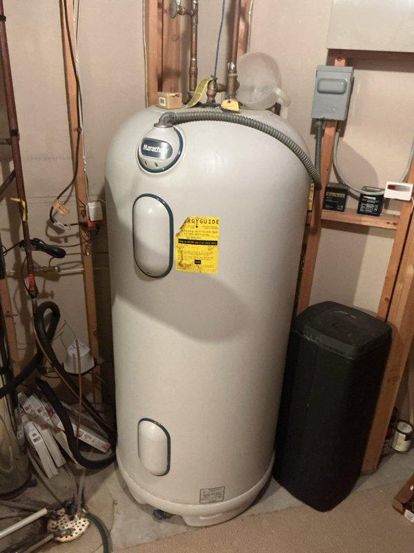Responded to service call for Marathon water heater producing no hot water despite power being on. Diagnosed electrical issue with the unit, inspected connections at junction box, and verified power supply. Performed necessary repairs to restore functionality of the Marathon tanked water heater system.