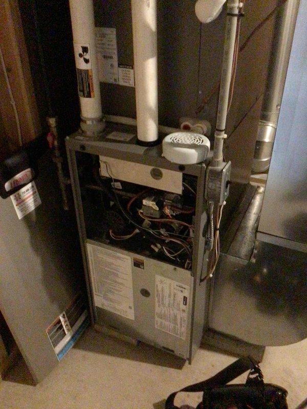 Responded to service call for unresponsive thermostat with blank display. Upon inspection, determined furnace disconnect switch was in OFF position, not a thermostat malfunction. Restored power to system, verified proper operation of Honeywell ProSeries thermostat and heating functionality.