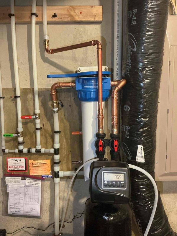 Responded to service call for leaking reverse osmosis faucet. Diagnosed manufacturing defect causing water to leak from the weep hole when activated. Removed defective unit and informed homeowner of need for replacement faucet, which they will purchase separately.