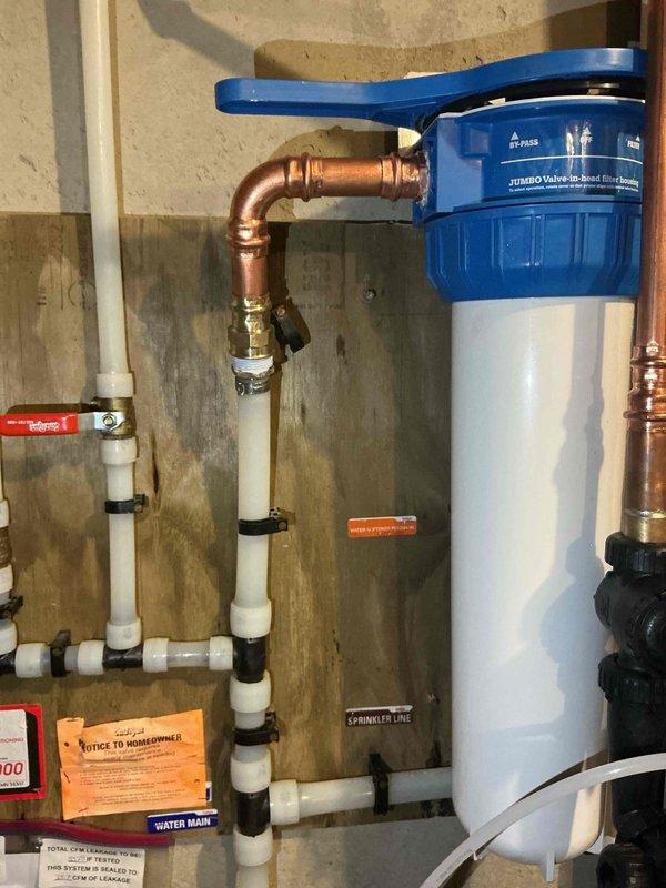 Responded to service call for leaking reverse osmosis faucet. Diagnosed manufacturing defect causing water to leak from the weep hole when activated. Removed defective unit and informed homeowner of need for replacement faucet, which they will purchase separately.