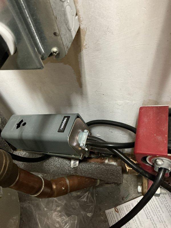 Responded to commercial service call for tanked water heater system with temperature inconsistency issues. Diagnosed problem with thermostatic recirculating system showing 190° on gauge but delivering inconsistent water temperature. Adjusted Riello thermostatic recirculating thermostat from 100° to 130° to resolve temperature fluctuation problem.