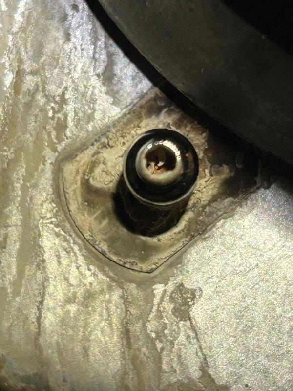 Diagnosed and repaired no heat condition on aging furnace by clearing corrosion buildup in pressure switch tube port and inducer motor. System was recycling repeatedly due to blocked pressure switch; removed obstruction and restored proper operation, though noted potential for future buildup recurrence.