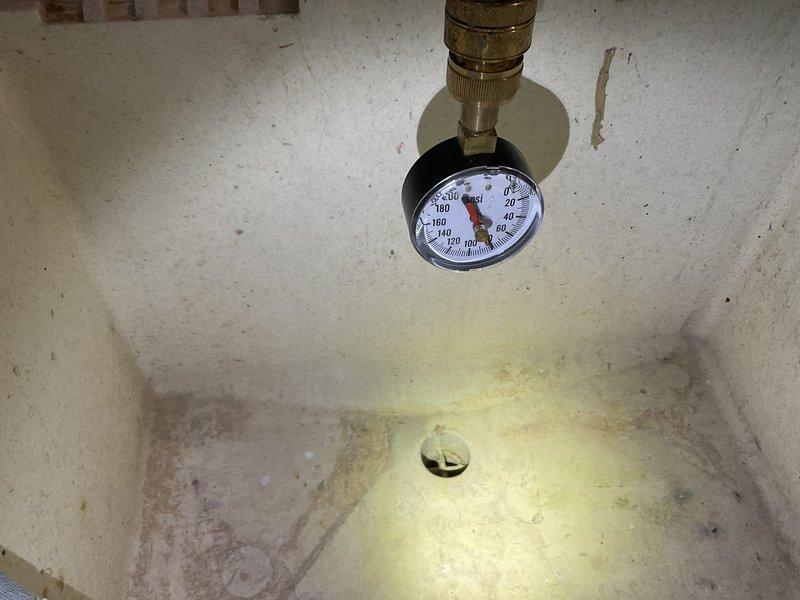 Conducted annual plumbing inspection and identified several issues requiring attention. Water pressure tested at approximately 100-120 PSI, exceeding recommended levels. Interior toilet tank inspection revealed significant mineral deposits, aging components, and a deteriorating fill valve requiring replacement. Provided estimates for recommended repairs including toilet fill valve replacement, bathroom sink stops, and water heater replacement.